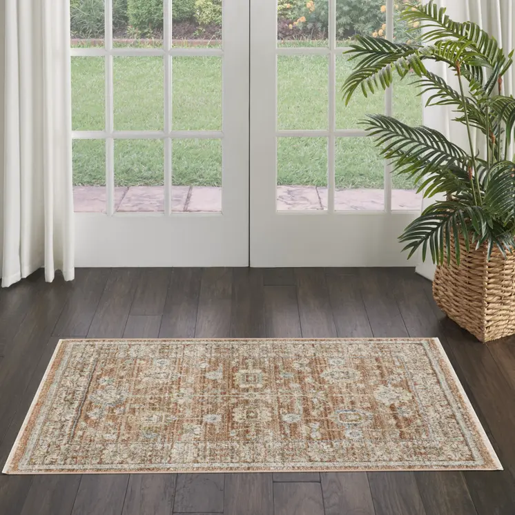 3' X 5' Orange and Ivory Oriental Power Loom Distressed Area Rug With Fringe