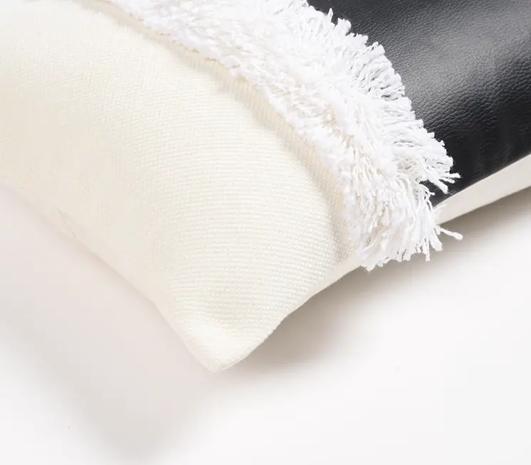 12" X 20" Black and White Patchwork Cotton Blend Throw Pillow Cover With Shag