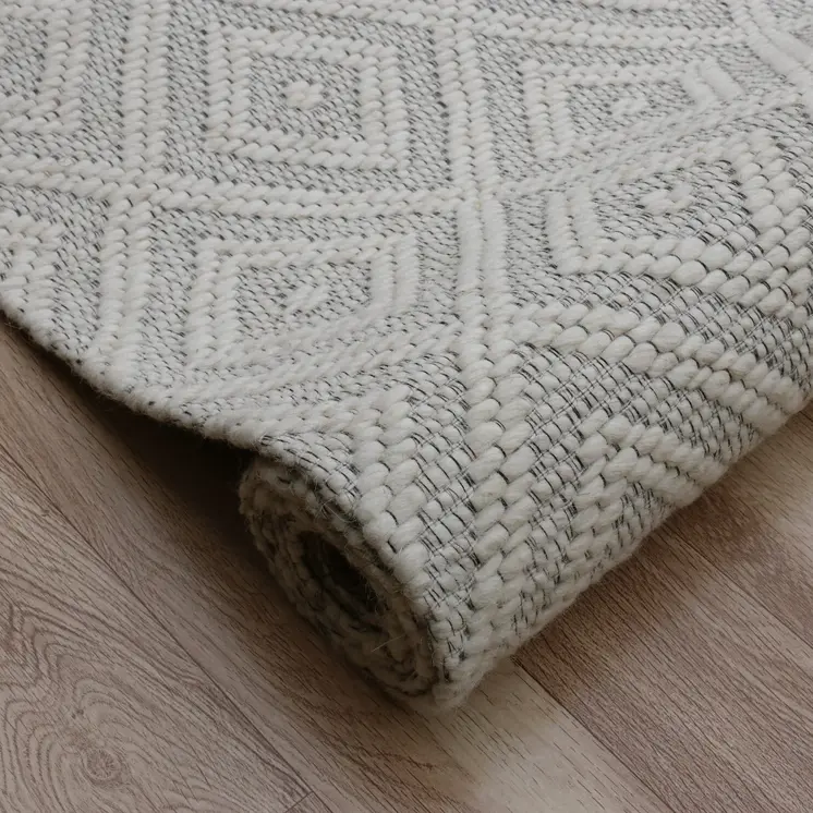 9' X 12' Ivory Wool Geometric Hand Woven Area Rug