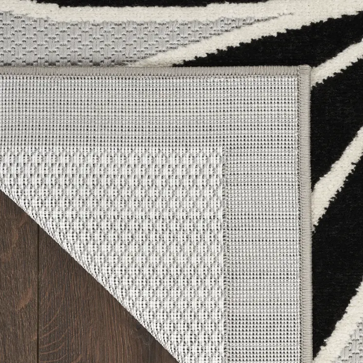 8' Black And White Floral Indoor Outdoor Runner Rug