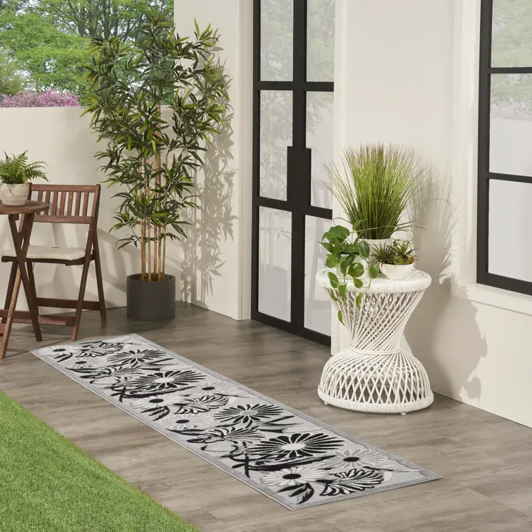 12' Black And White Floral Indoor Outdoor Runner Rug