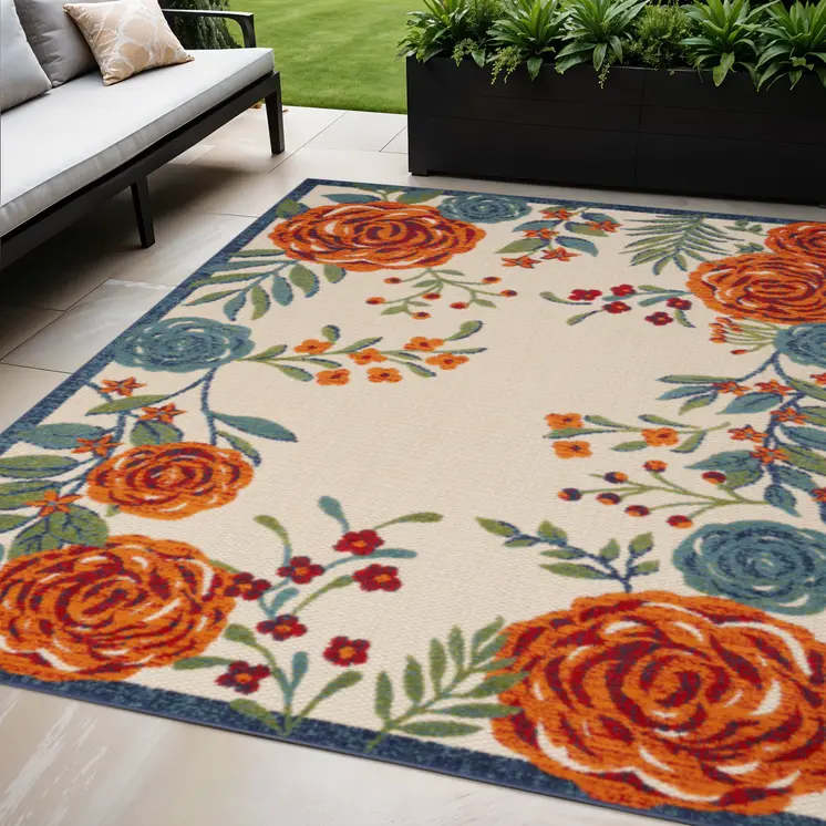 5' X 8' Ivory Blue Orange And Green Floral Indoor Outdoor Area Rug