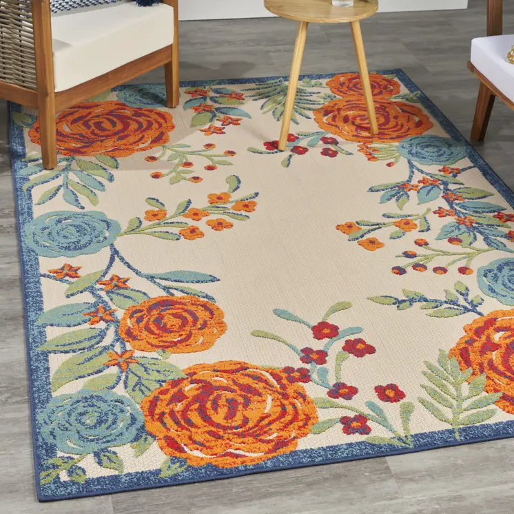 5' X 8' Ivory Blue Orange And Green Floral Indoor Outdoor Area Rug