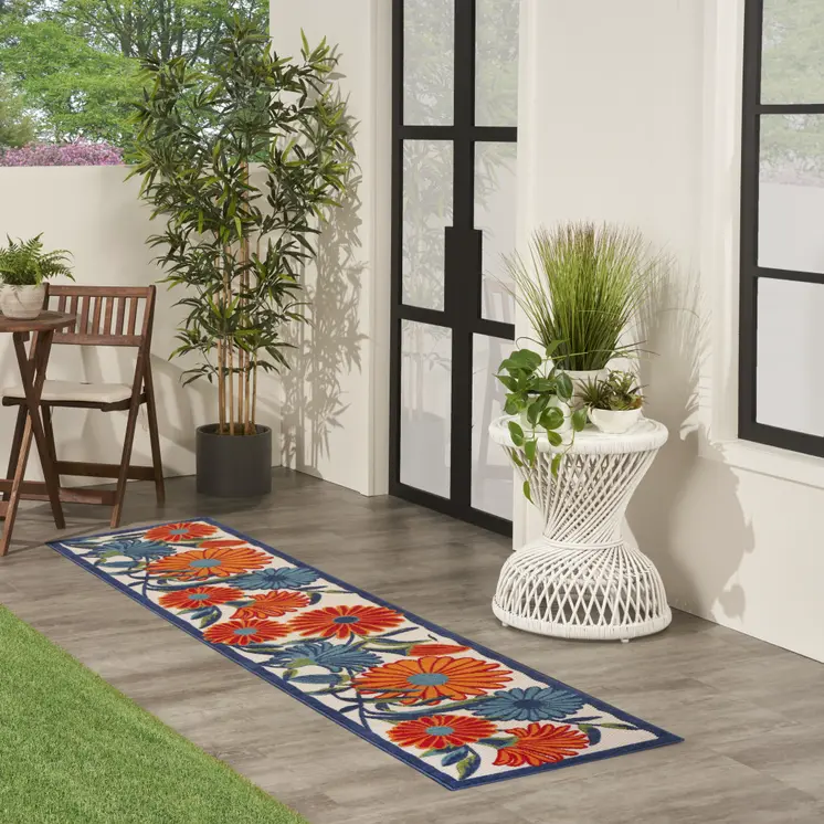 8' Ivory Blue And Orange Floral Indoor Outdoor Runner Rug