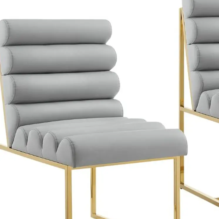 Set of Two Tufted Gray And Gold Upholstered Faux Leather Dining Side Chairs