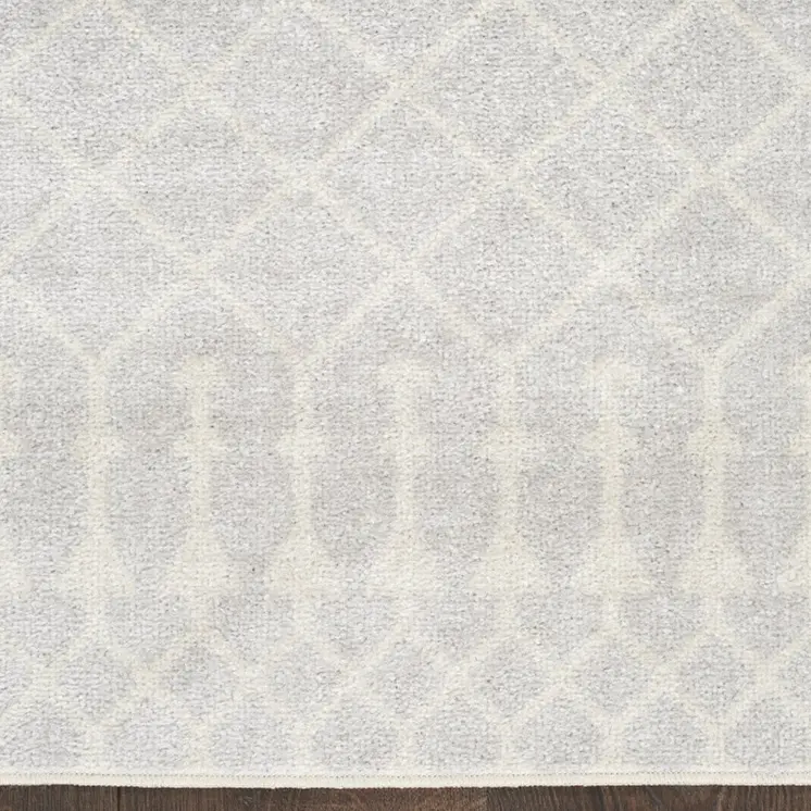 9' X 12' Blue and Ivory Abstract Power Loom Washable Area Rug