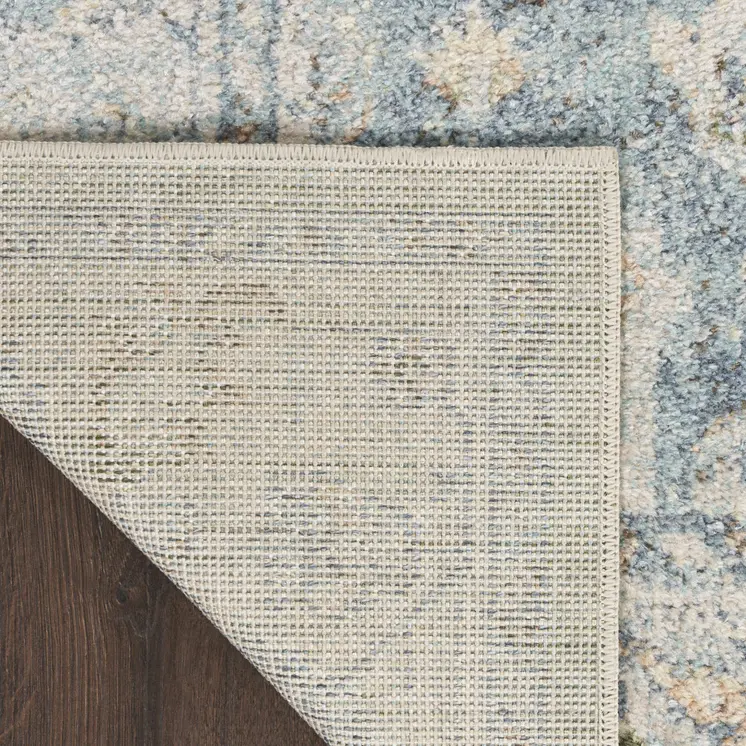 10' Blue And Ivory Floral Medallion Distressed Washable Runner Rug