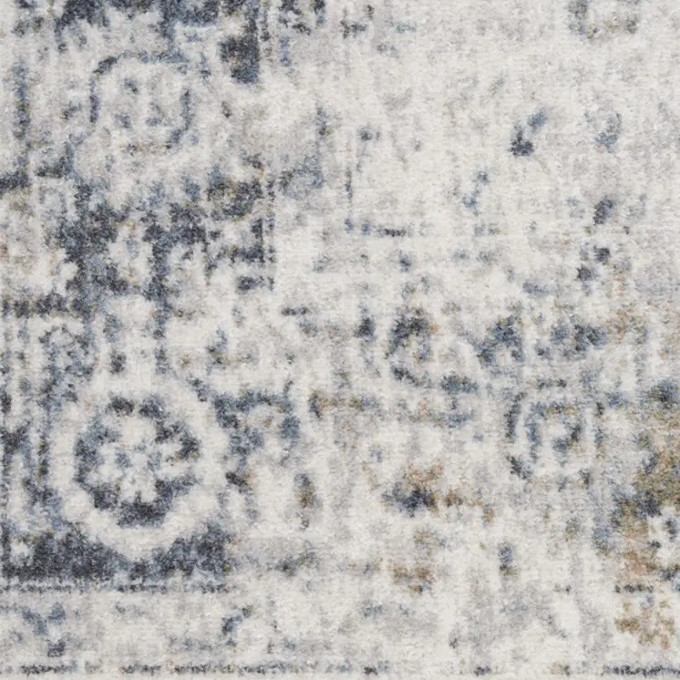 7' X 9' Blue and Ivory Floral Medallion Power Loom Distressed Washable Area Rug