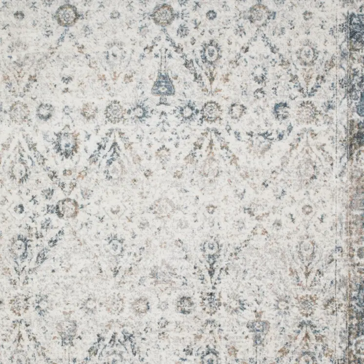 7' X 9' Blue and Ivory Floral Medallion Power Loom Distressed Washable Area Rug