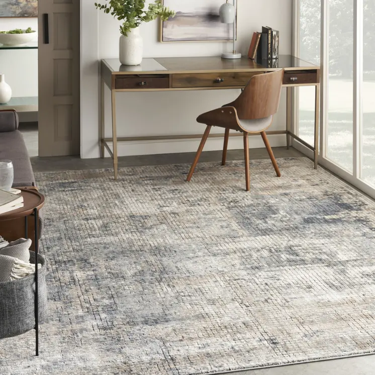 9' X 12' Beige and Blue Abstract Power Loom Distressed Area Rug