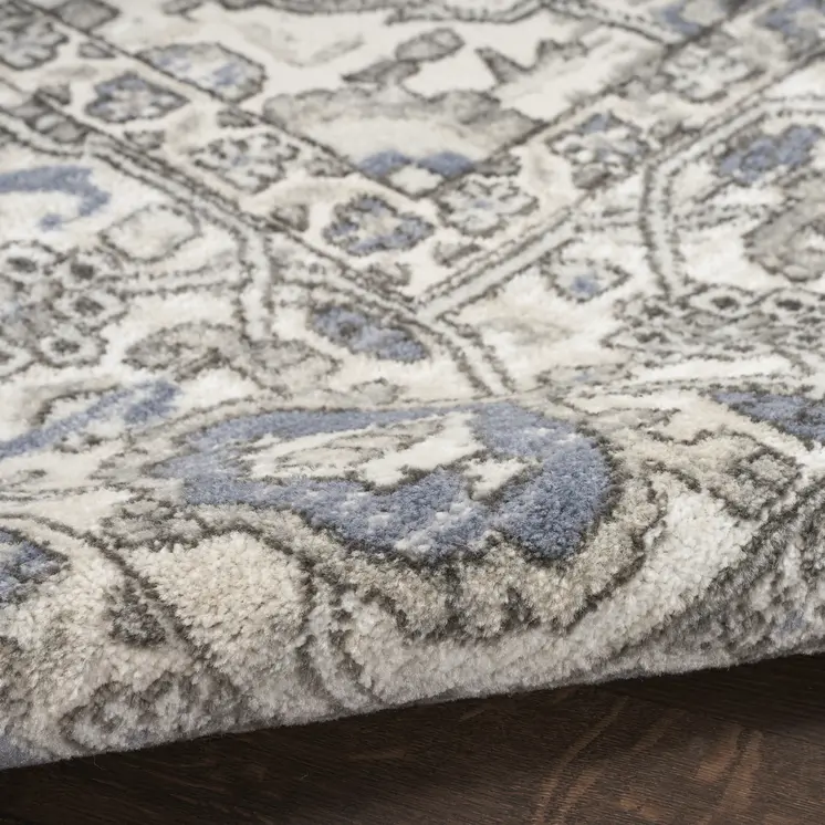 4' X 6' Blue And Ivory Medallion Distressed Area Rug