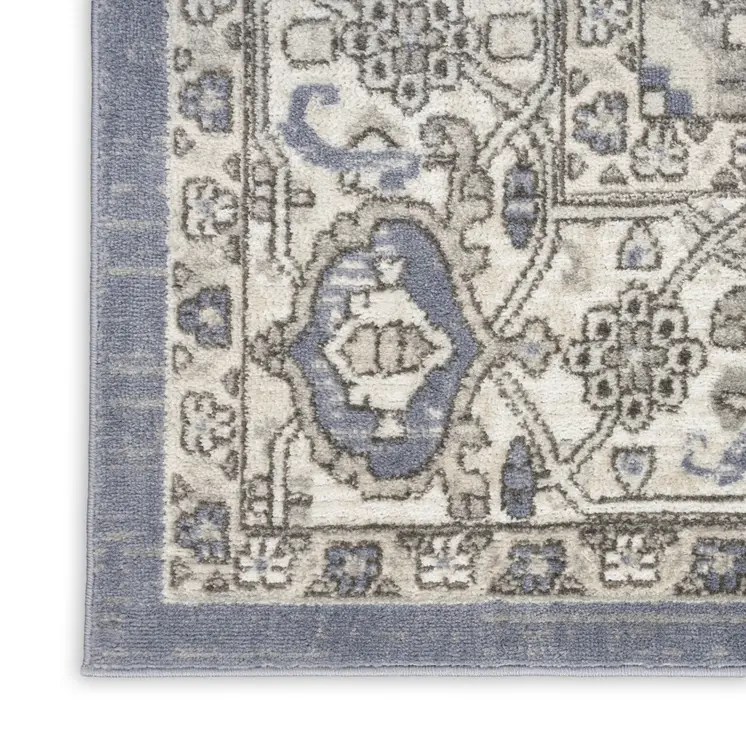 4' X 6' Blue And Ivory Medallion Distressed Area Rug