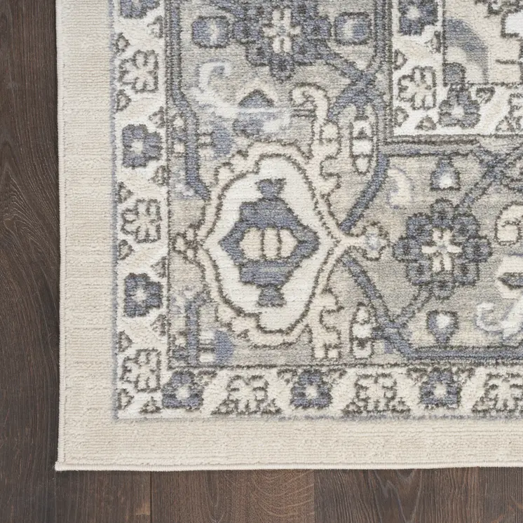 4' X 6' Blue and Ivory Medallion Power Loom Distressed Area Rug