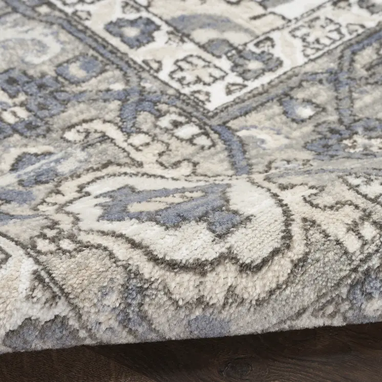 4' X 6' Blue and Ivory Medallion Power Loom Distressed Area Rug