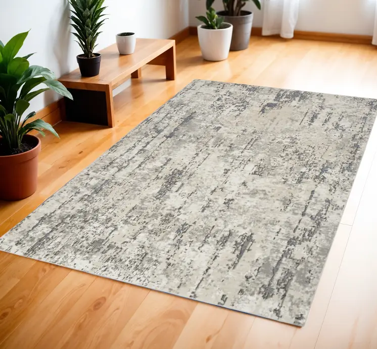 4' X 6' Gray and Ivory Abstract Power Loom Area Rug