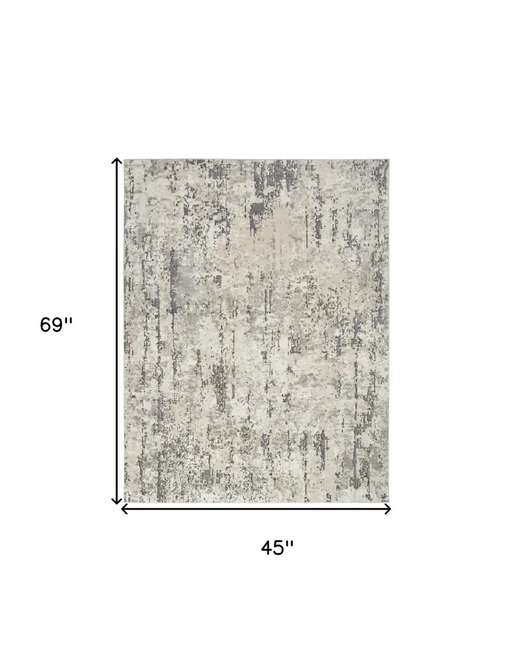4' X 6' Gray and Ivory Abstract Power Loom Area Rug
