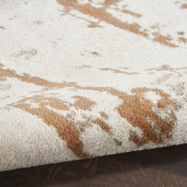 5' X 7' Red and Ivory Abstract Power Loom Area Rug