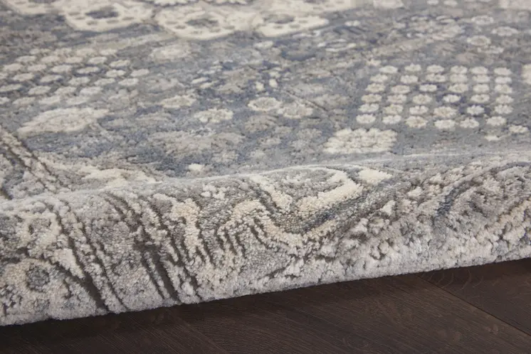 7' X 10' Gray and Ivory Medallion Power Loom Area Rug