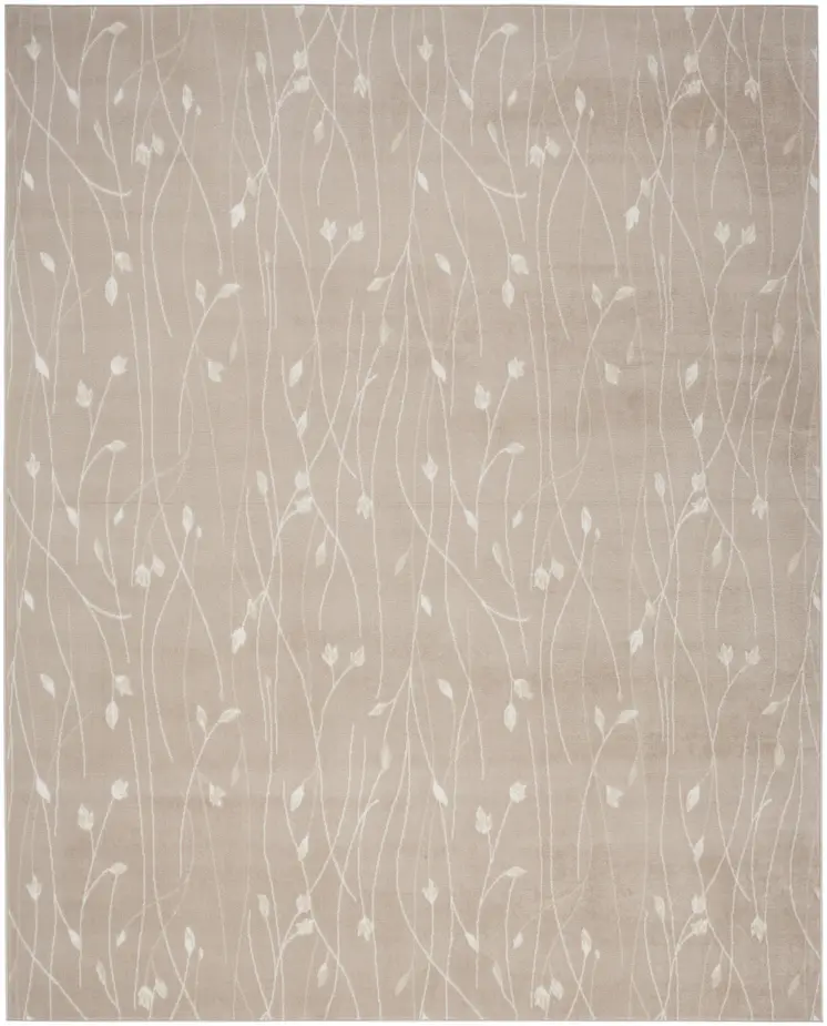 5' X 7' Beige and Ivory Floral Power Loom Area Rug