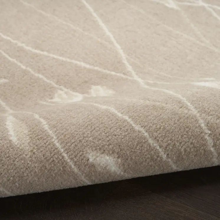 8' X 10' Beige and Ivory Floral Power Loom Area Rug
