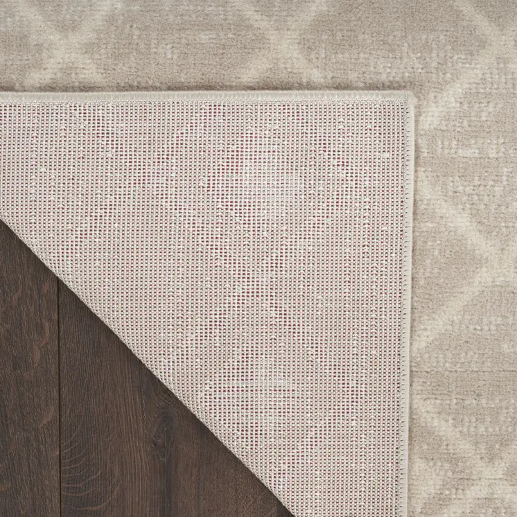5' X 7' Beige and Ivory Moroccan Power Loom Area Rug