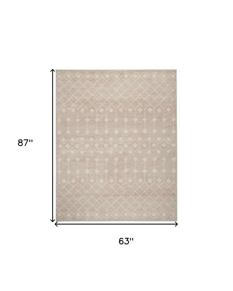 5' X 7' Beige and Ivory Moroccan Power Loom Area Rug