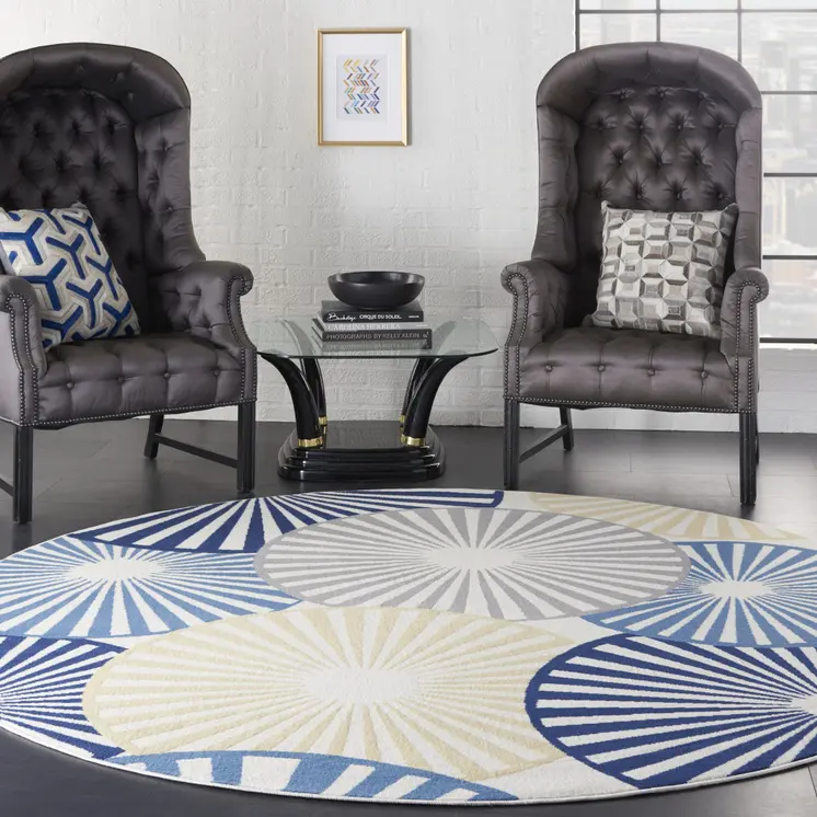 8' Blue and Ivory Round Geometric Power Loom Area Rug