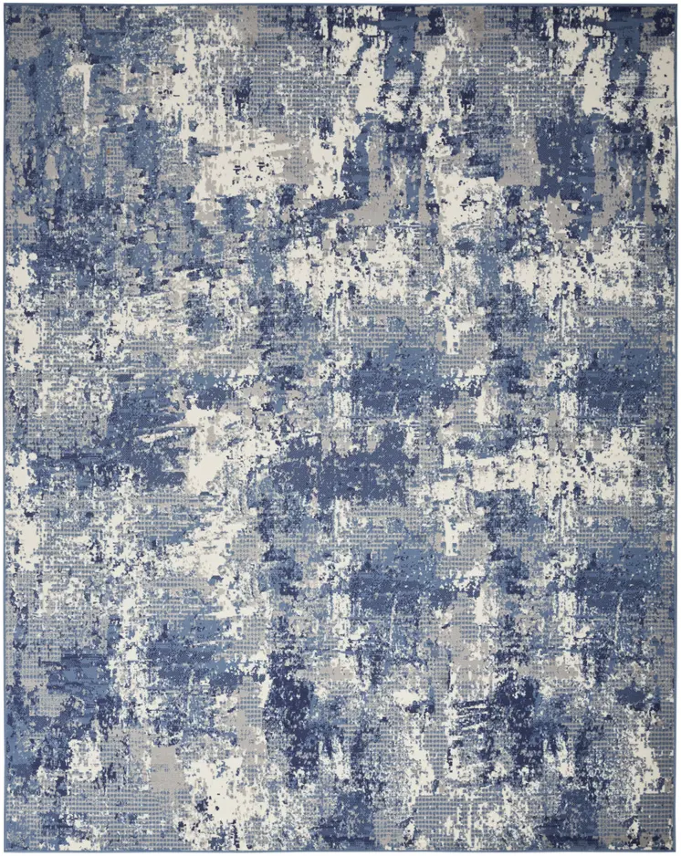 5' X 7' Blue and Ivory Abstract Power Loom Area Rug
