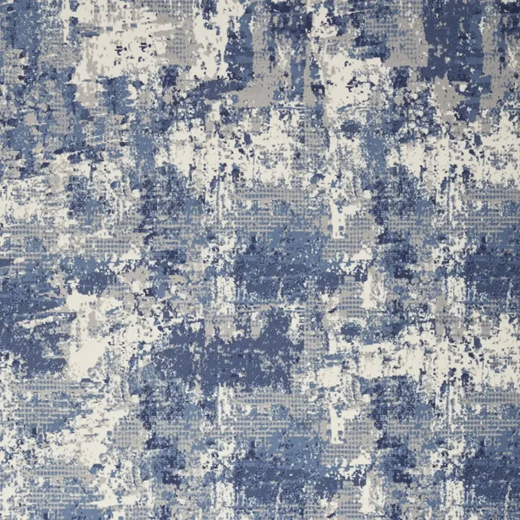 5' X 7' Blue and Ivory Abstract Power Loom Area Rug
