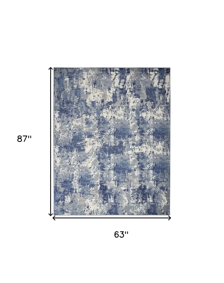5' X 7' Blue and Ivory Abstract Power Loom Area Rug