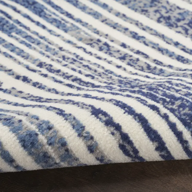 5' X 7' Blue and Gray Striped Power Loom Area Rug