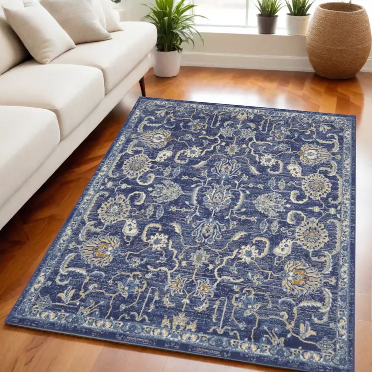 5' X 7' Blue and Beige Floral Power Loom Area Rug
