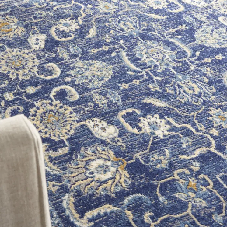 6' X 9' Blue and Beige Floral Power Loom Area Rug