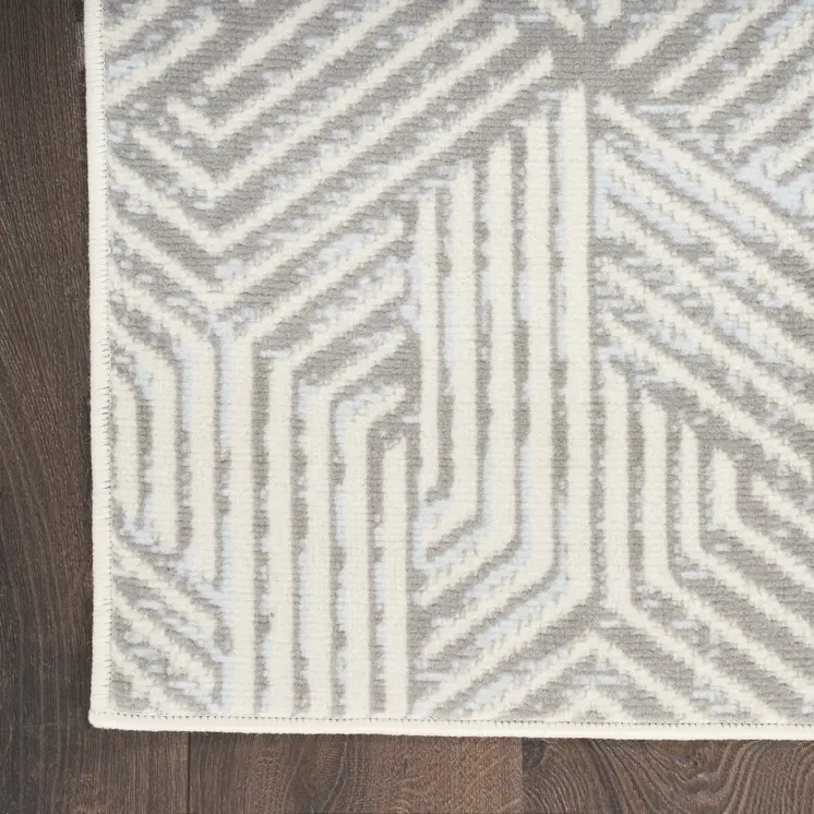 5' X 7' Gray and Ivory Geometric Power Loom Area Rug
