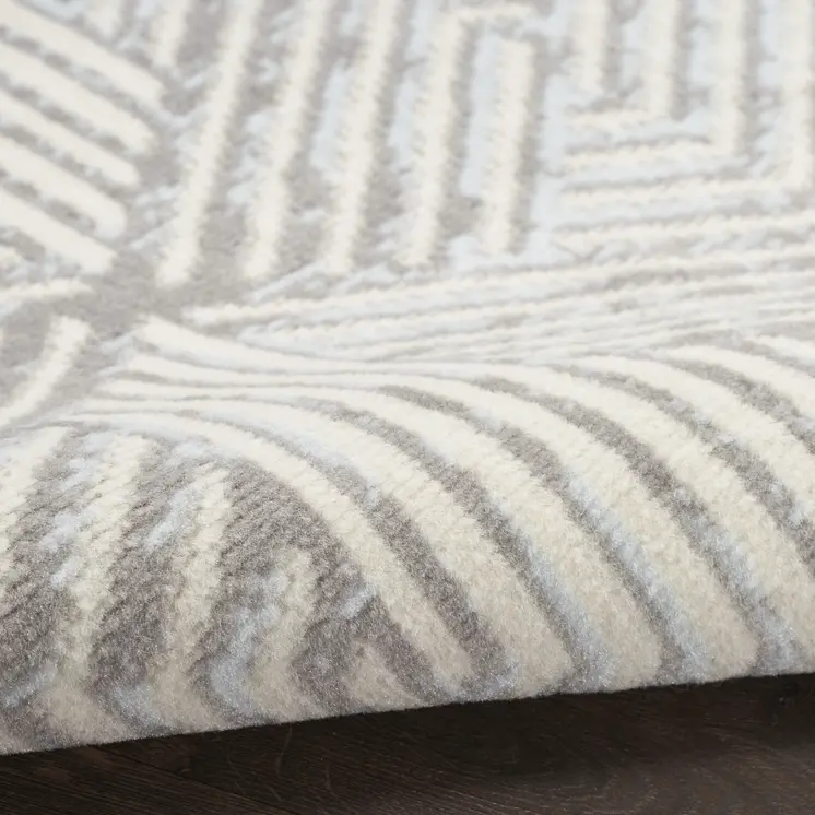 5' X 7' Gray and Ivory Geometric Power Loom Area Rug