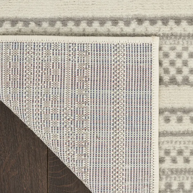 5' X 7' Gray and Ivory Striped Power Loom Distressed Area Rug