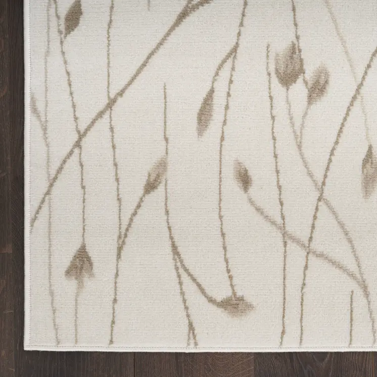 8' X 10' Beige and Ivory Floral Power Loom Area Rug