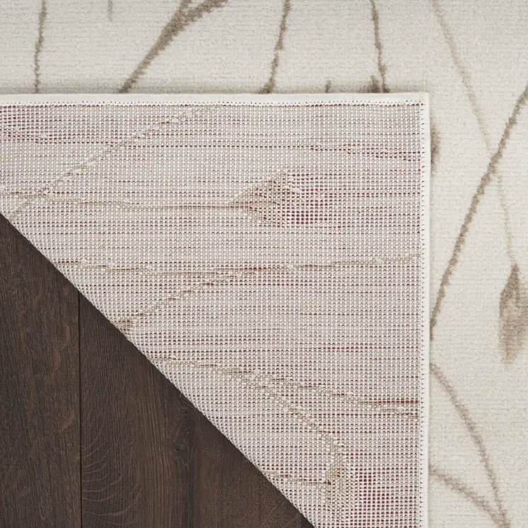 8' X 10' Beige and Ivory Floral Power Loom Area Rug