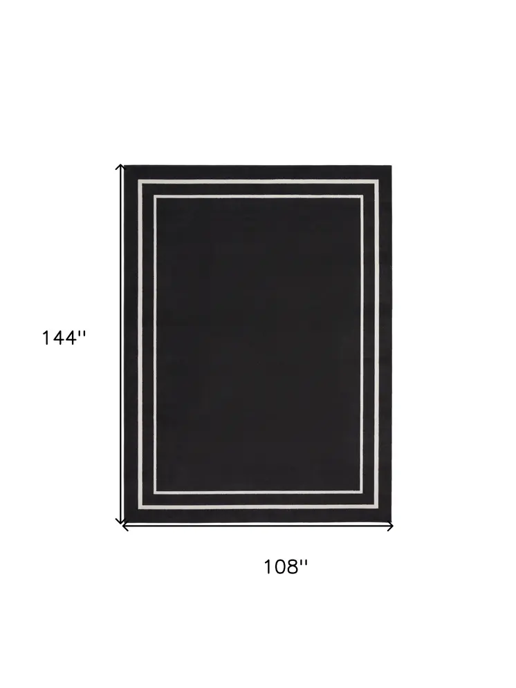 9' X 12' Black And Ivory Indoor Outdoor Area Rug