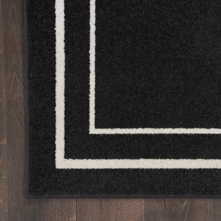 6' Black And Ivory Indoor Outdoor Runner Rug
