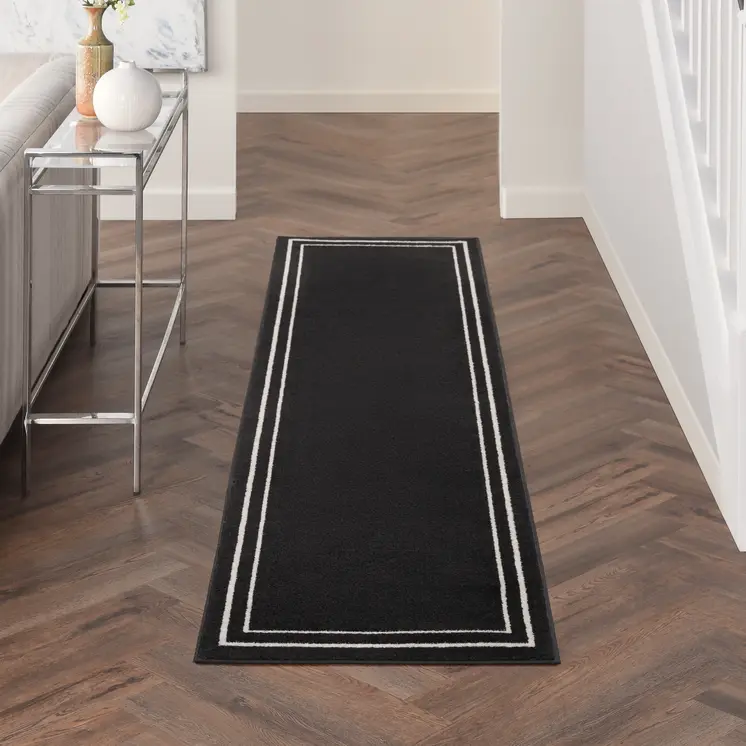 6' Black And Ivory Indoor Outdoor Runner Rug