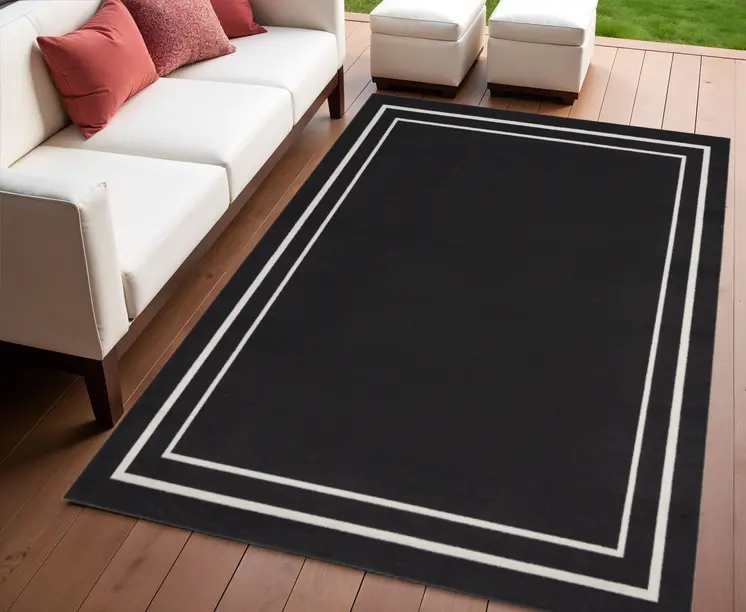 4' X 6' Black And Ivory Indoor Outdoor Area Rug