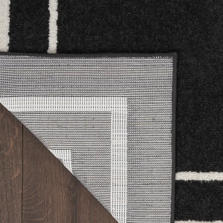 4' X 6' Black And Ivory Indoor Outdoor Area Rug