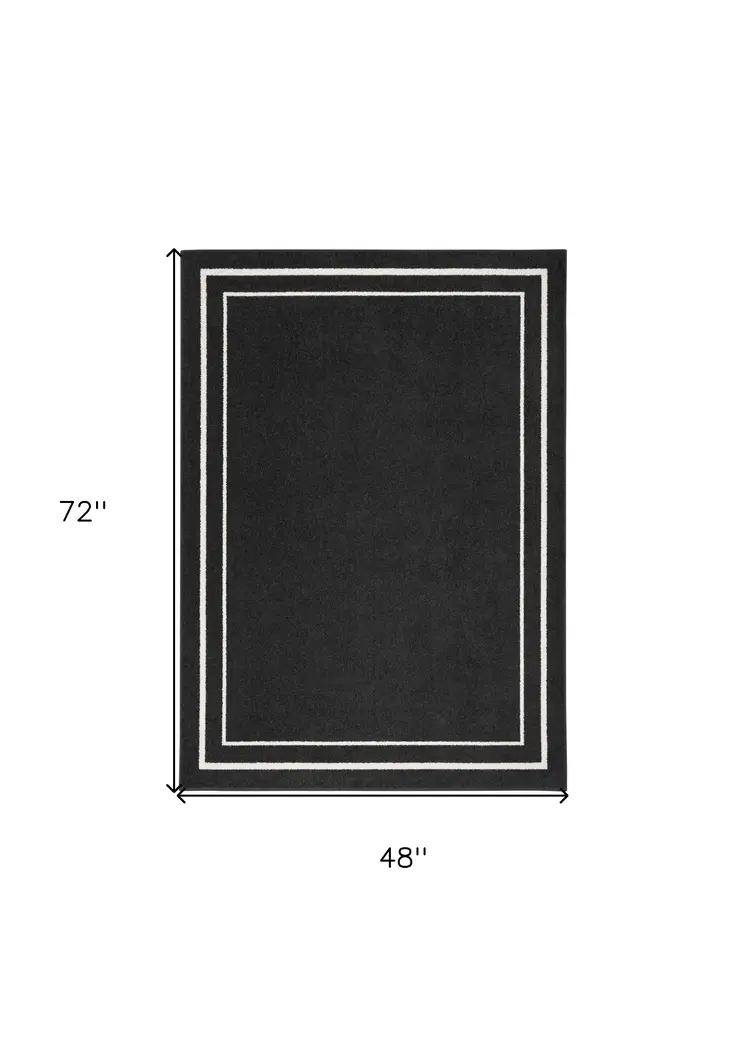 4' X 6' Black And Ivory Indoor Outdoor Area Rug