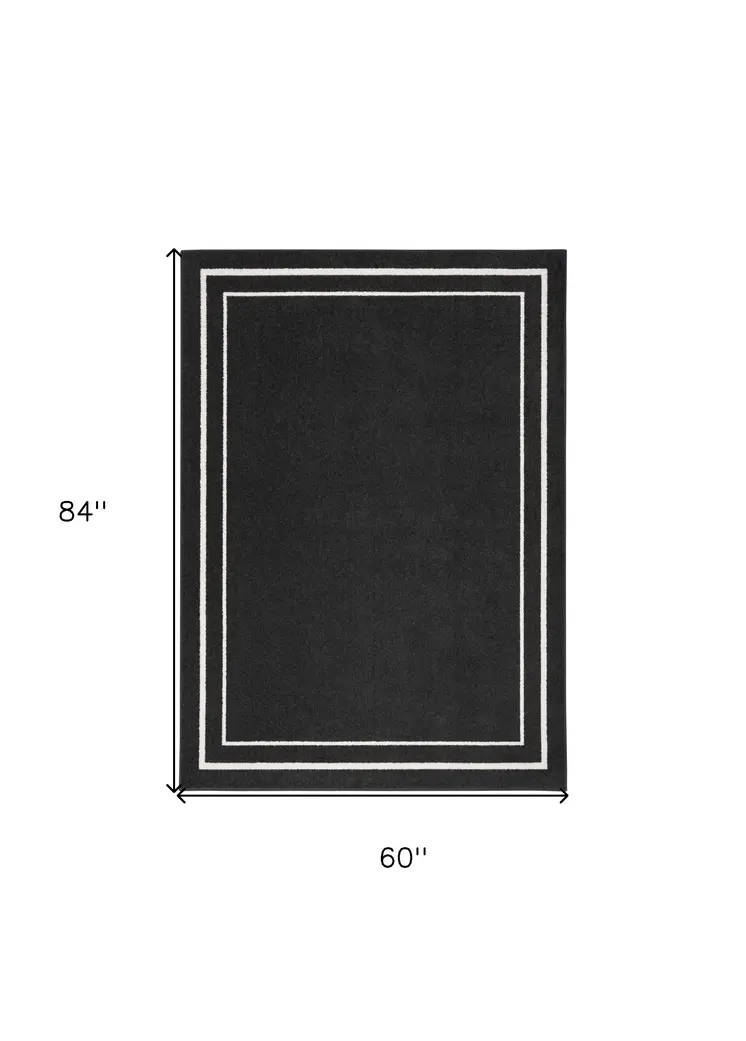 5' X 7' Black And Ivory Indoor Outdoor Area Rug