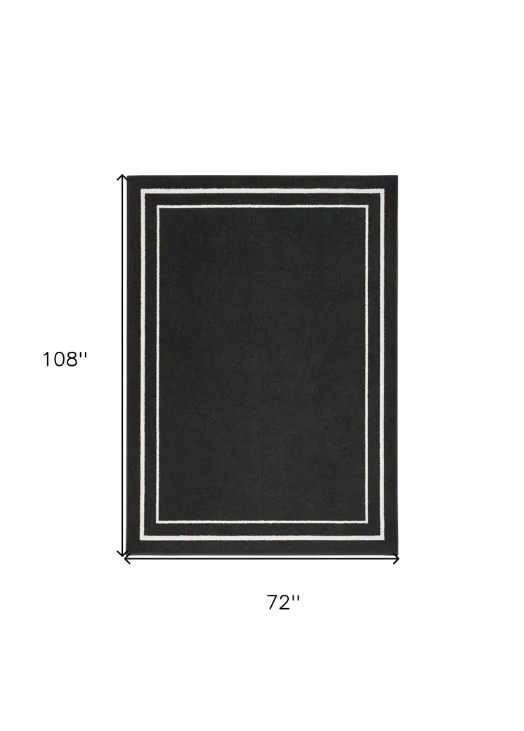 6' X 9' Black And Ivory Indoor Outdoor Area Rug