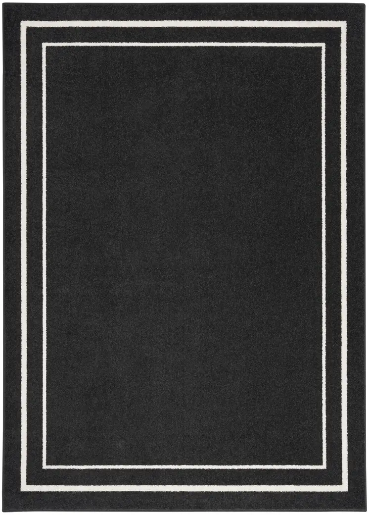 6' X 9' Black And Ivory Indoor Outdoor Area Rug