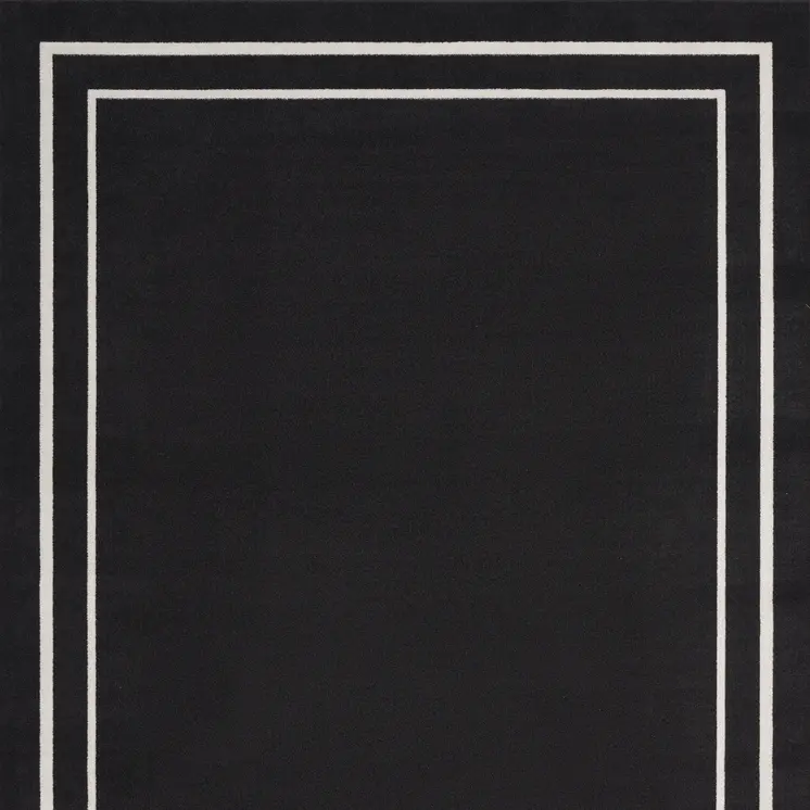 8' X 10' Black And Ivory Indoor Outdoor Area Rug