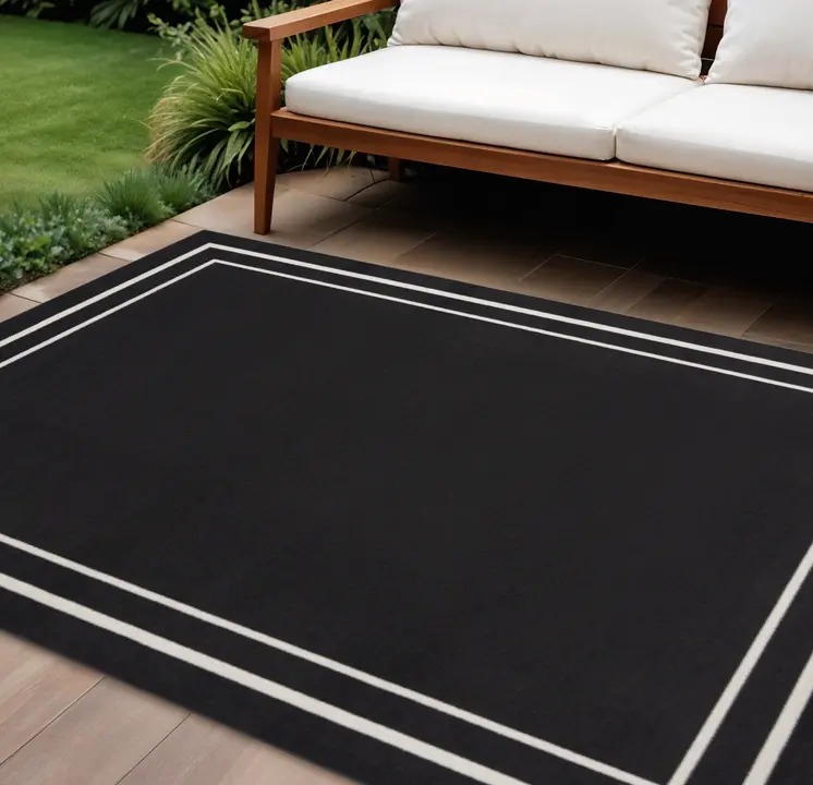 8' X 10' Black And Ivory Indoor Outdoor Area Rug
