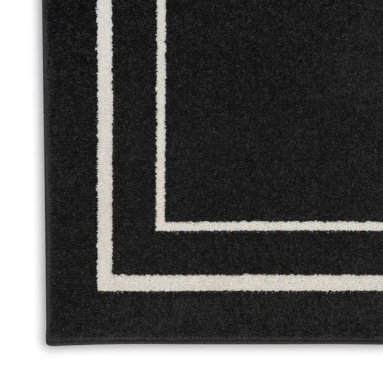 8' X 10' Black And Ivory Indoor Outdoor Area Rug